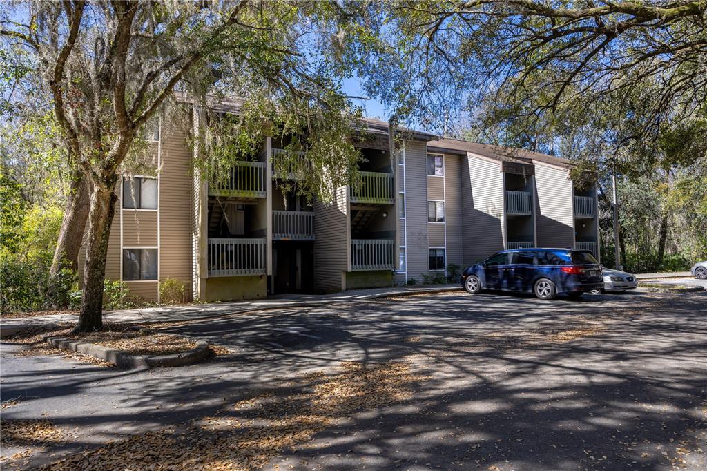 83 Southeast 16th Avenue, Unit E103 Gainesville, FL 32601 - Photo 1 of 1 a view of a house with street view