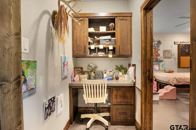 a view of a bedroom and bedroom with furniture