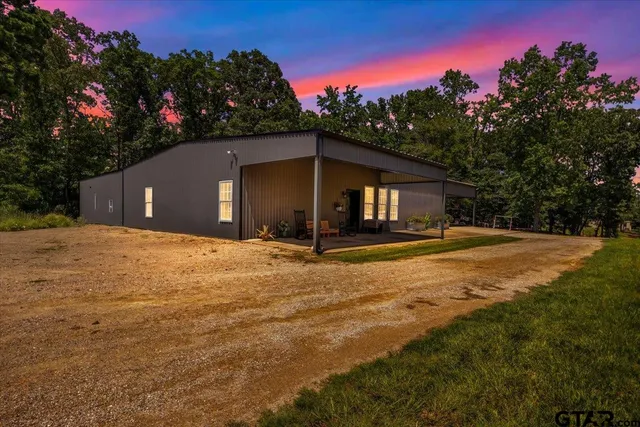 a house view with a outdoor space