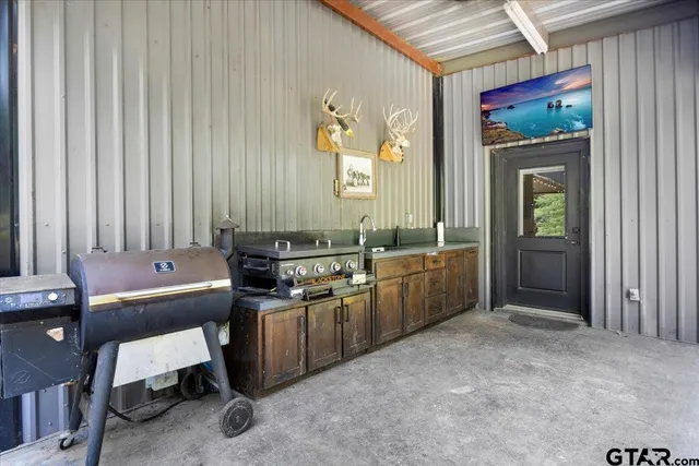 a room with a chair and furniture