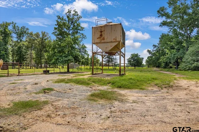 a view of a park with swings and slides