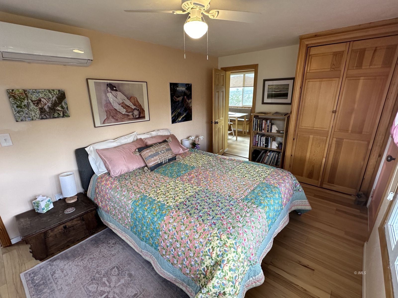 220 East Fulton Street Darwin, CA 93522 - Photo 20 of 34 a bedroom with a bed painting on wall and a dresser