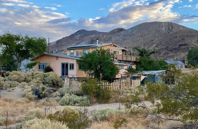 a house view with a garden space