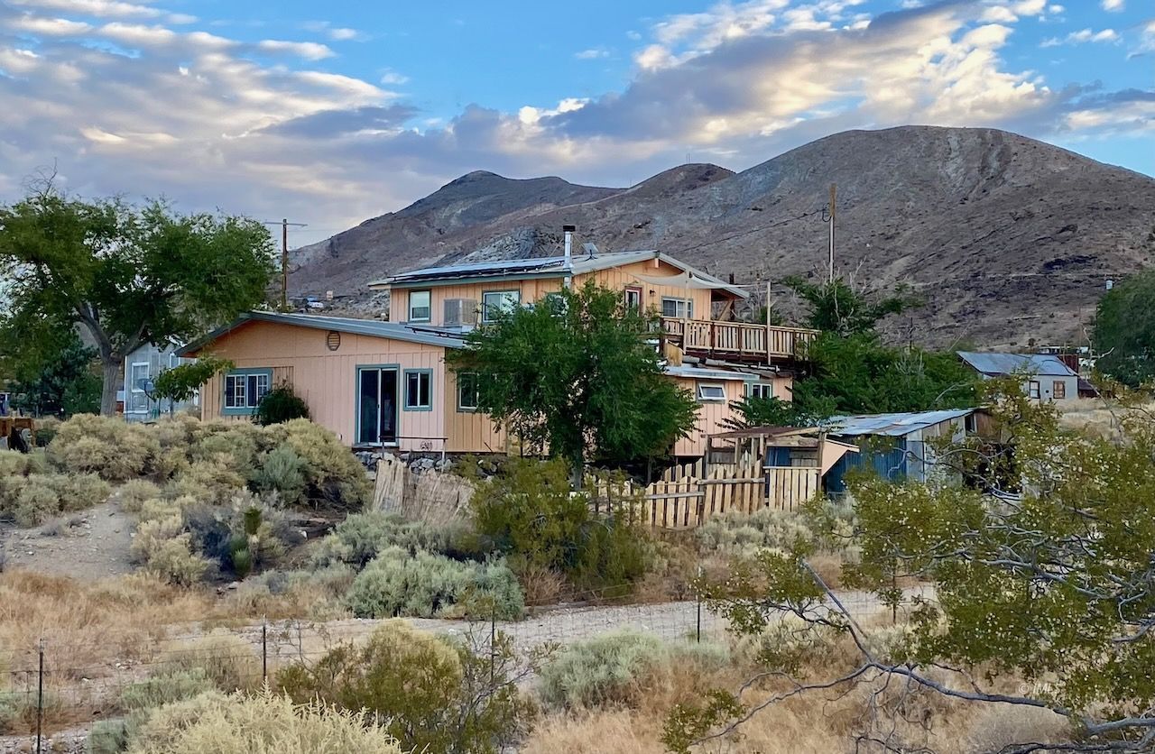 220 East Fulton Street Darwin, CA 93522 - Photo 2 of 34 a house view with a garden space