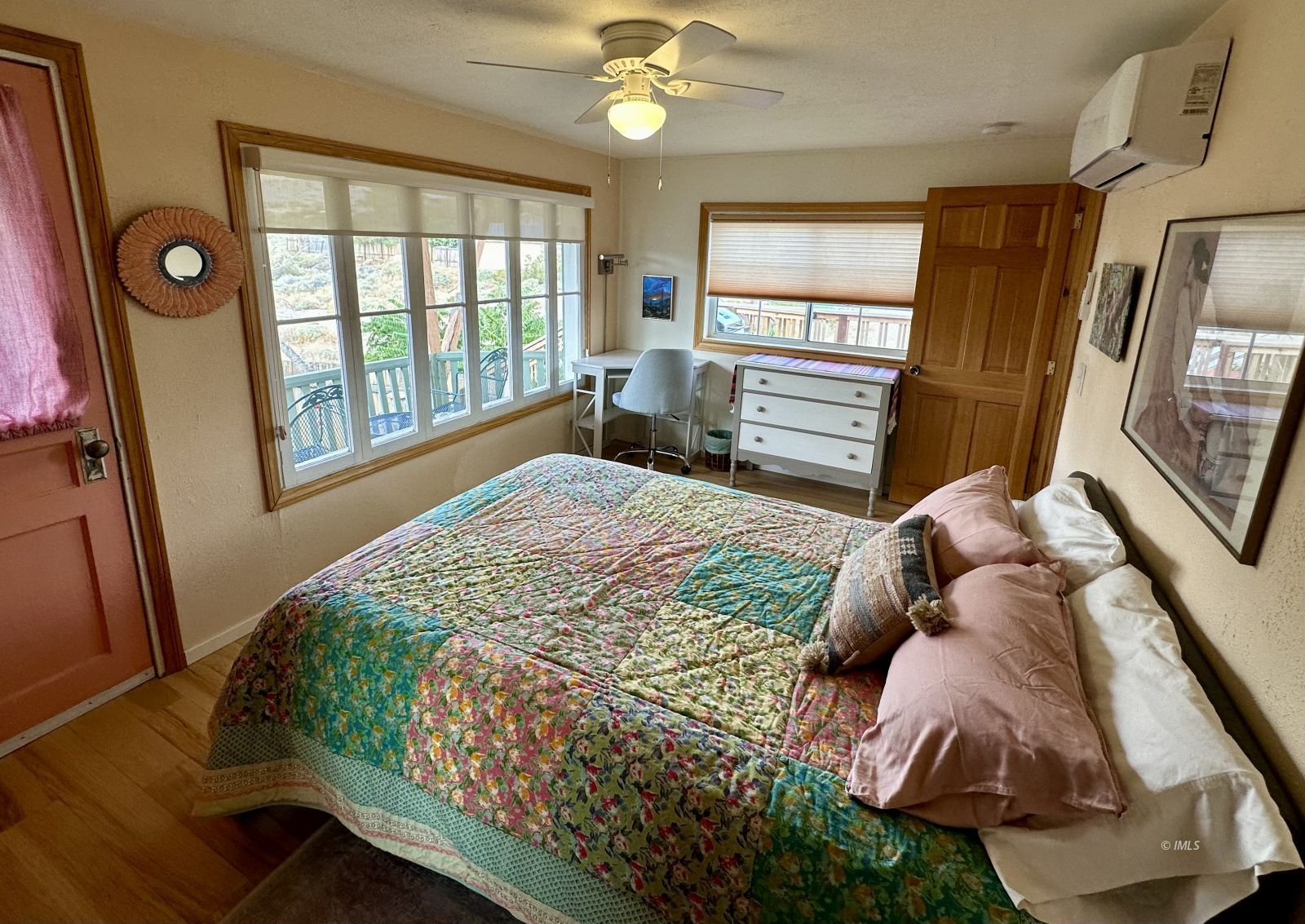 220 East Fulton Street Darwin, CA 93522 - Photo 21 of 34 a bed sitting in a bedroom next to a window