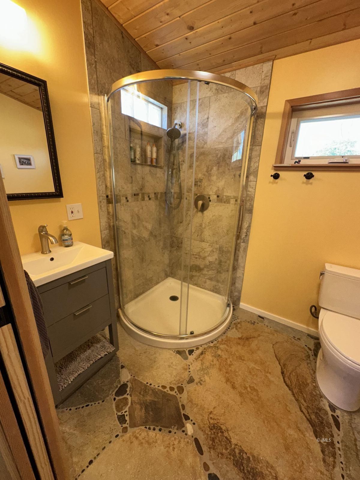 220 East Fulton Street Darwin, CA 93522 - Photo 22 of 34 a bathroom with a sink a toilet and shower