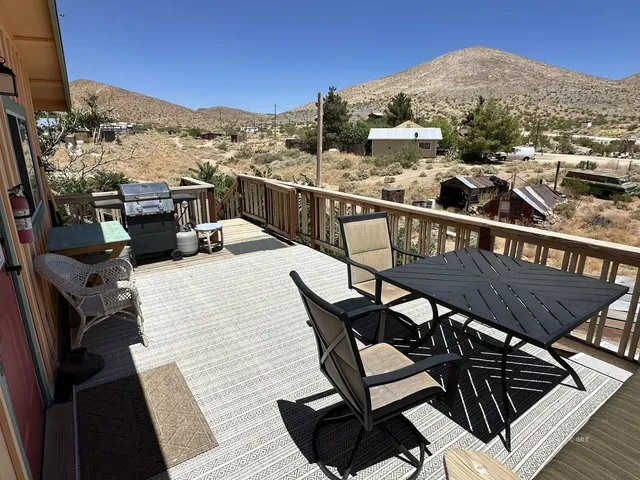 a bed sitting in a roof deck