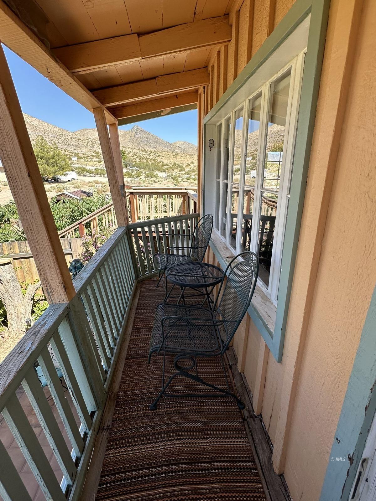 220 East Fulton Street Darwin, CA 93522 - Photo 25 of 34 a view of balcony with furniture
