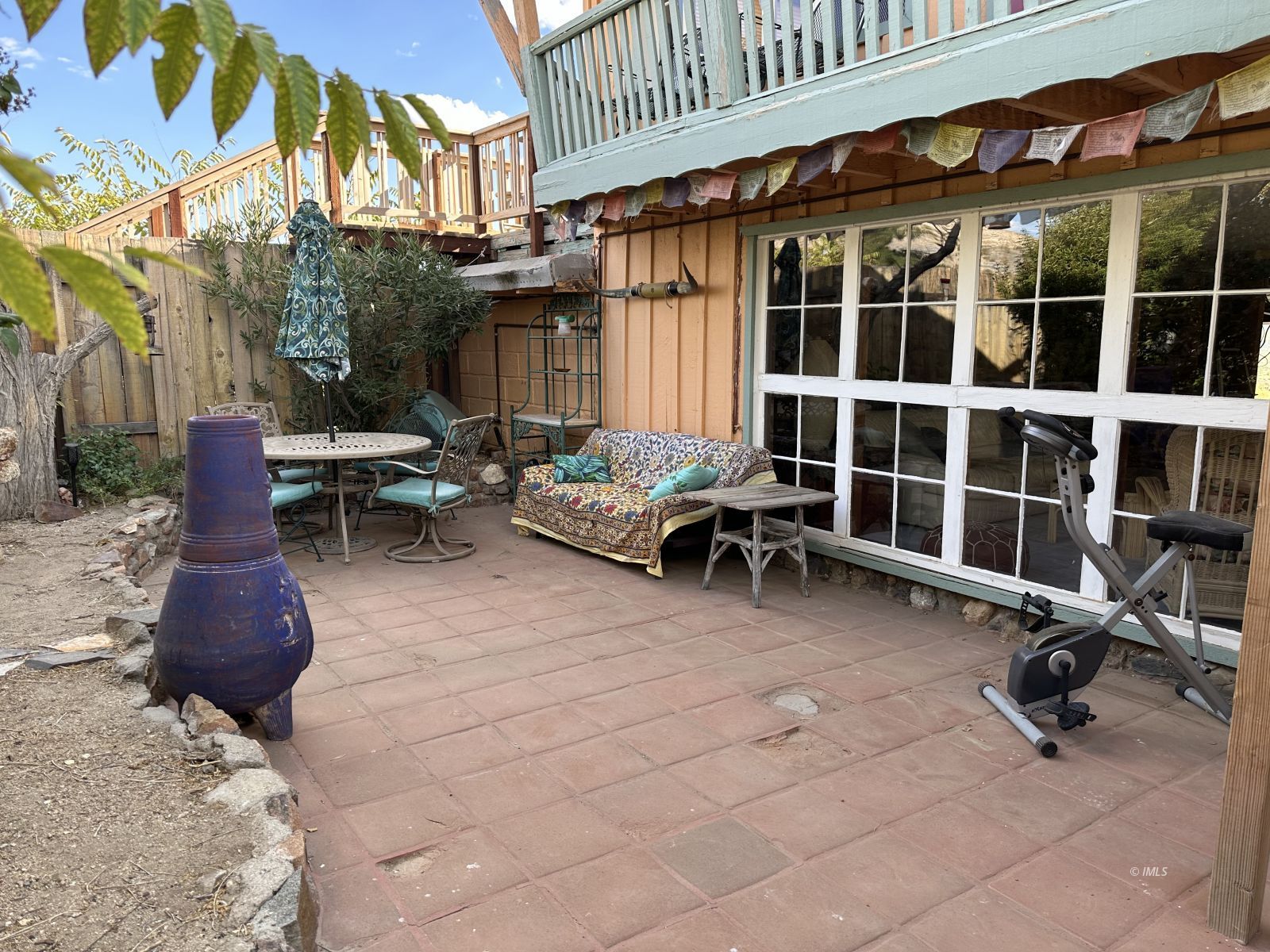 220 East Fulton Street Darwin, CA 93522 - Photo 27 of 34 a view of a chairs and table in a patio