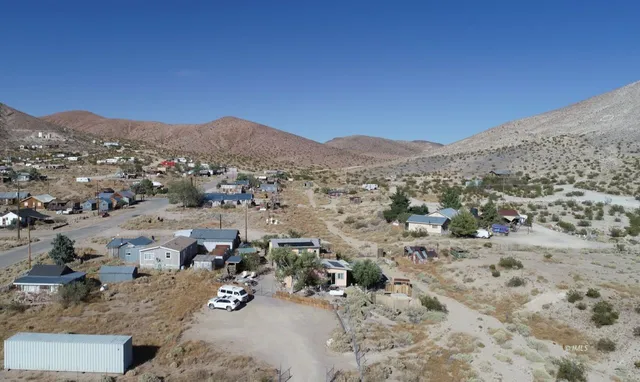 an aerial view of mountain with trees