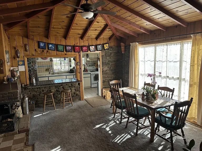 220 East Fulton Street Darwin, CA 93522 - Photo 6 of 34 a view of a dining room with furniture window and outside view