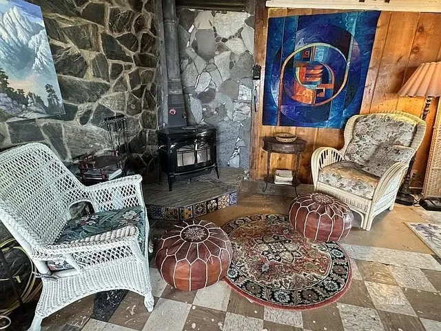 a living room with furniture and rug