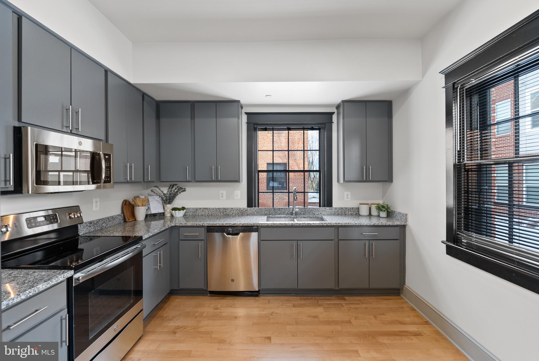 9071 Power House Road, Unit 103 Lorton, VA 22079 - Photo 10 of 48 The large kitchen offers room for multiple cooks.