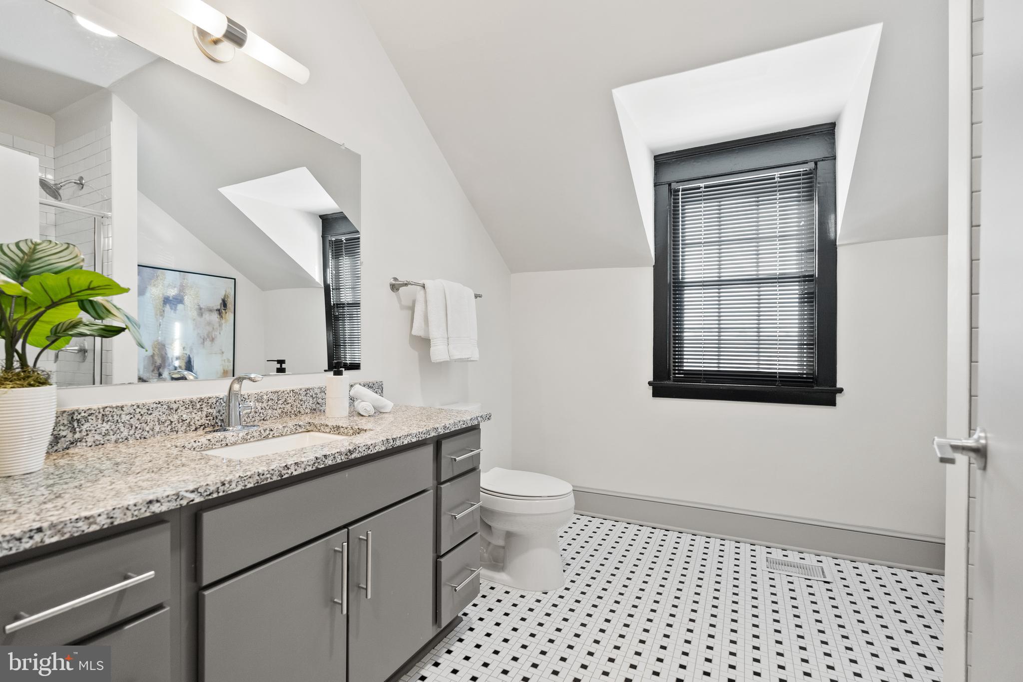 9071 Power House Road, Unit 103 Lorton, VA 22079 - Photo 27 of 48 The spacious ensuite bathroom with large vanity.