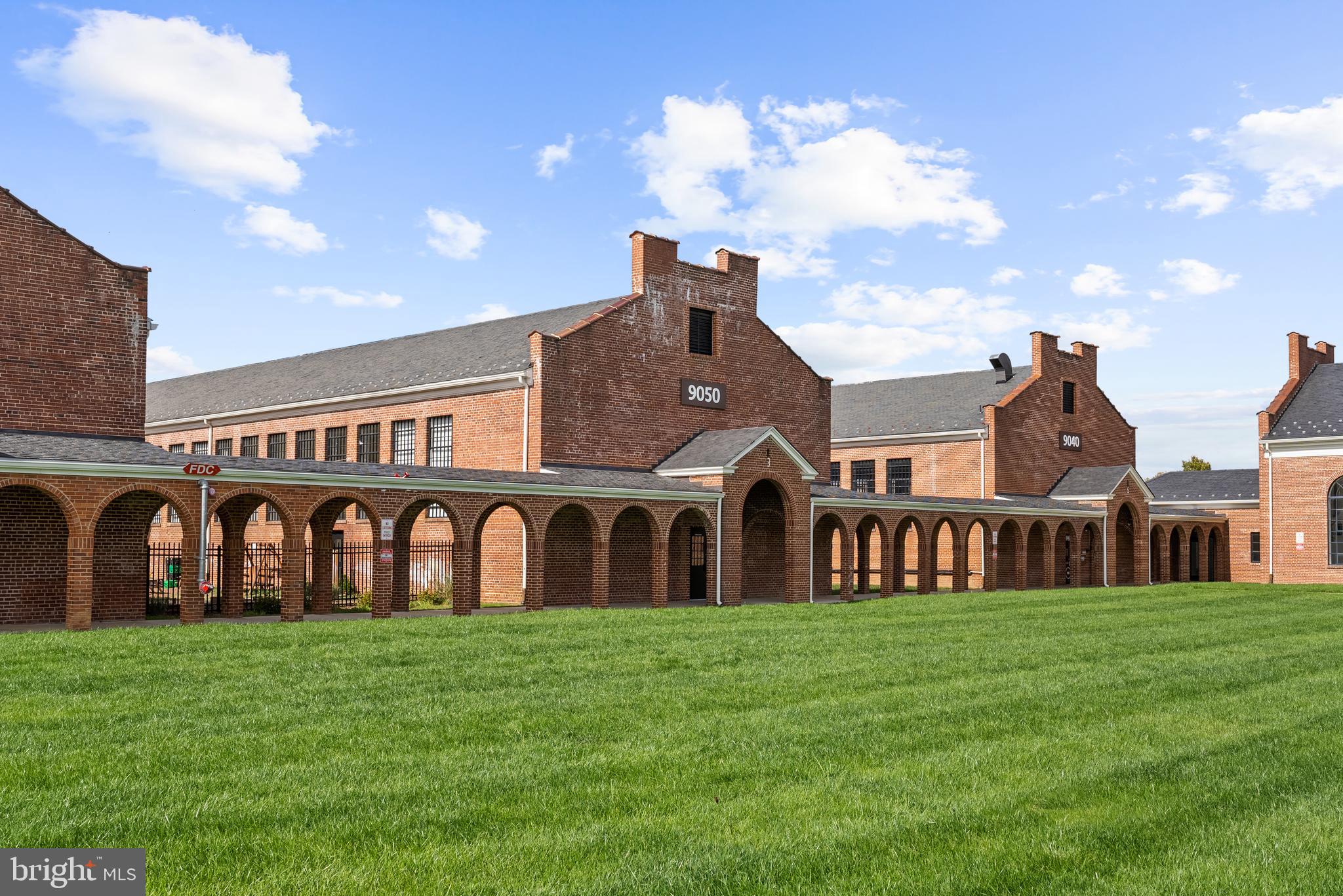 9071 Power House Road, Unit 103 Lorton, VA 22079 - Photo 43 of 48 Enjoy the historic architecture and verdent lawns.