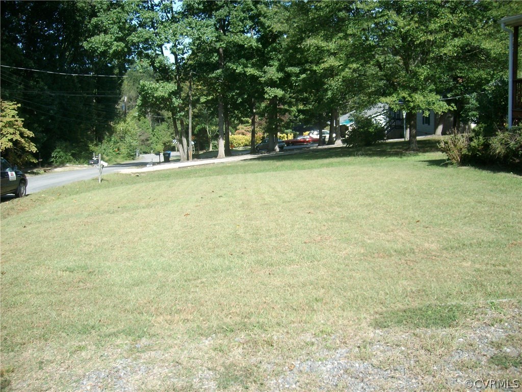 3301 Sylvania Road Chester, VA 23831 - Photo 3 of 13 a view of a park with large trees