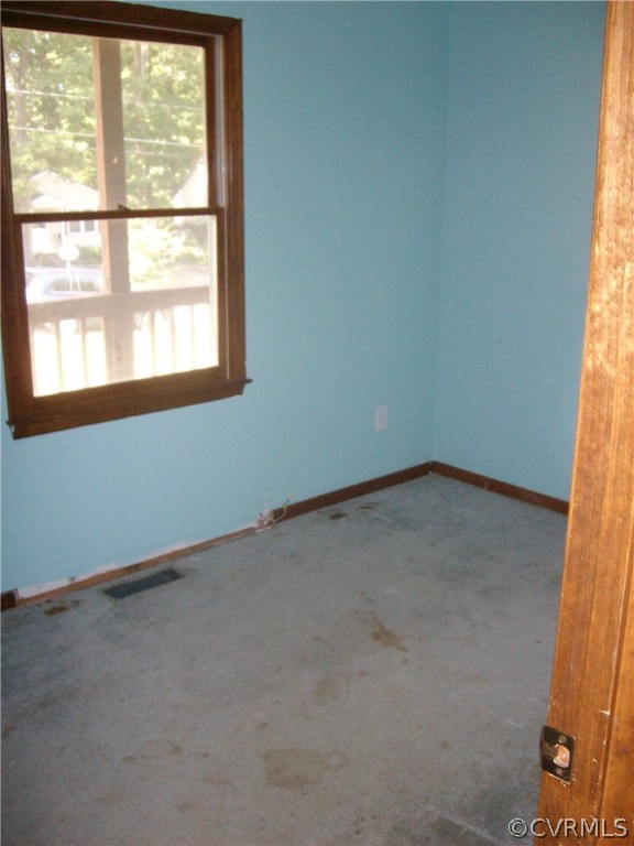 3301 Sylvania Road Chester, VA 23831 - Photo 10 of 13 an empty room with a window