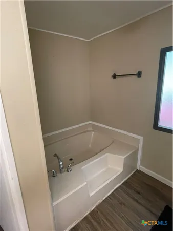 a bathroom with a bathtub
