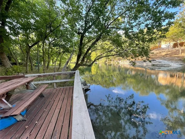 a view of a balcony with lake view