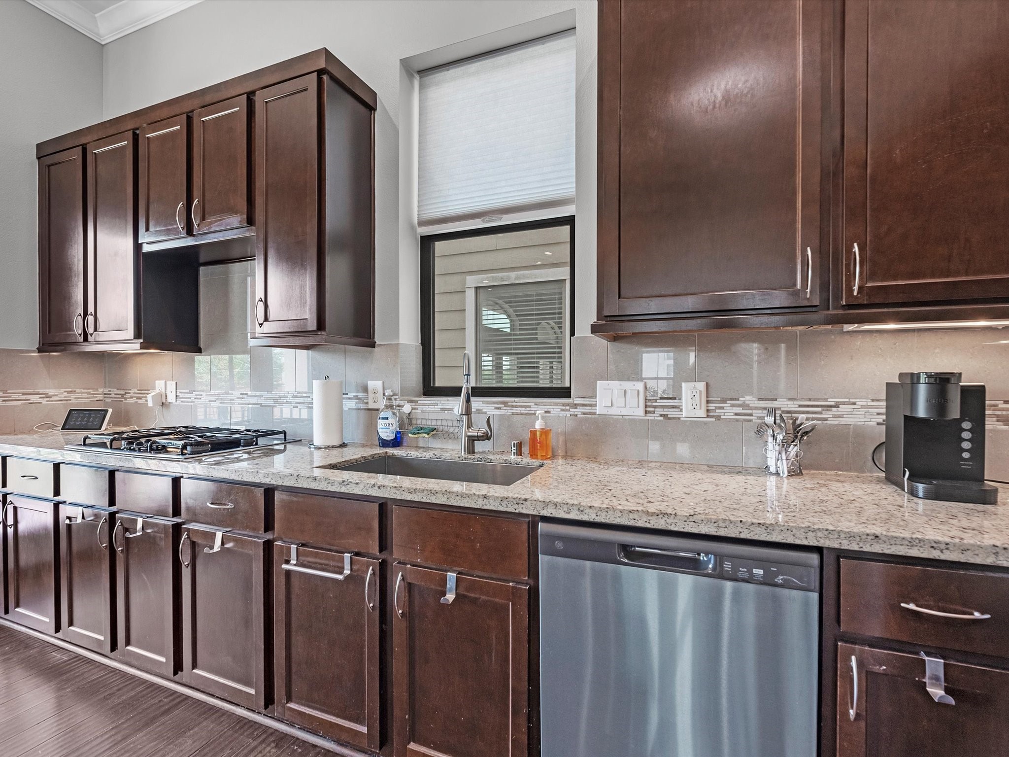 3610 Chenevert Street Houston, TX 77004 - Photo 32 of 32 Discover a well-maintained kitchen featuring an open floor plan and a charming Juliet balcony.