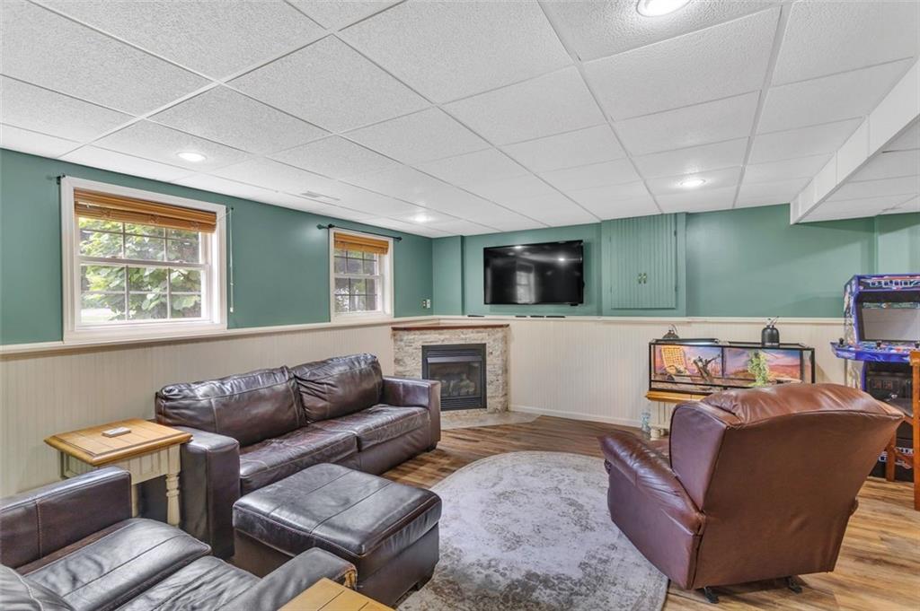 152 Cupps Road Renfrew, PA 16053 - Photo 32 of 43 a living room with furniture and a flat screen tv