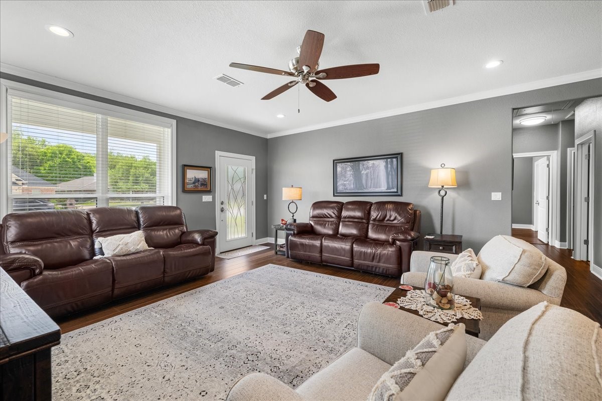 1207 Pecan Street Brenham, TX 77833 - Photo 12 of 29 a living room with furniture and a large window