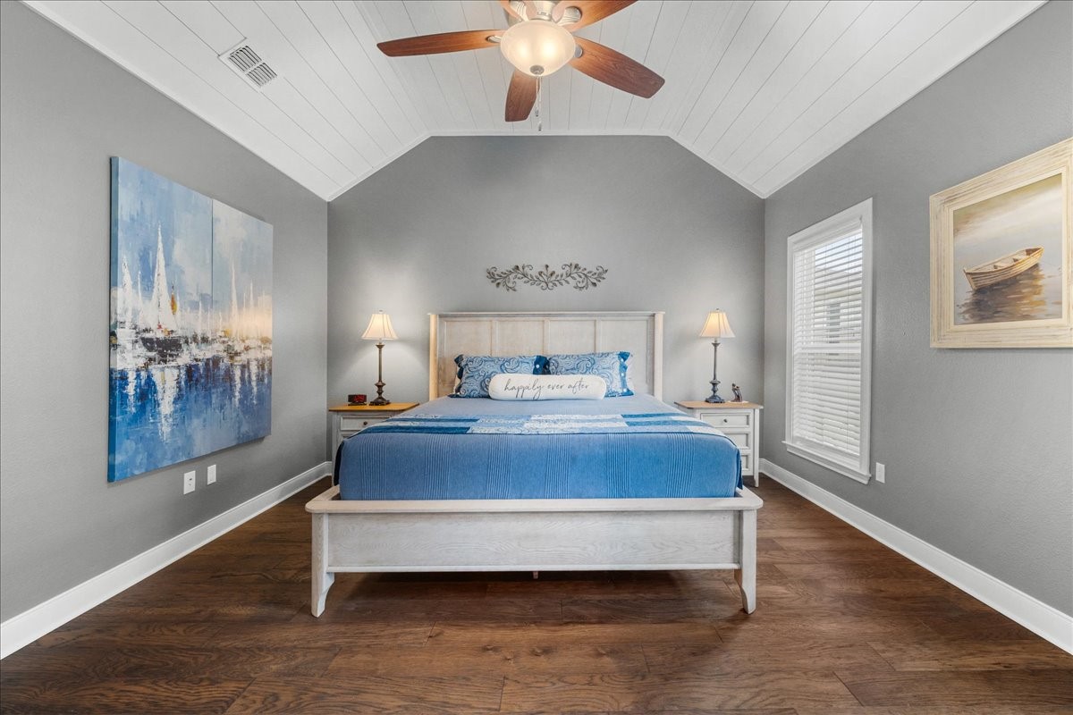 1207 Pecan Street Brenham, TX 77833 - Photo 14 of 29 a bedroom with a bed and window