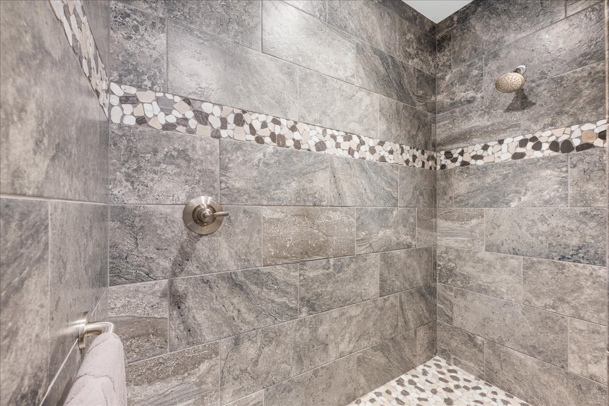 1207 Pecan Street Brenham, TX 77833 - Photo 17 of 29 a bathroom with a shower