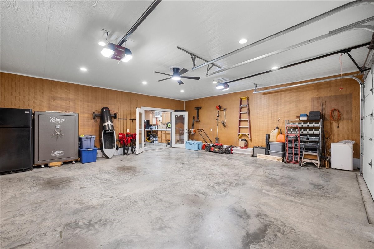 1207 Pecan Street Brenham, TX 77833 - Photo 22 of 29 a view of a room with gym equipment and a large window