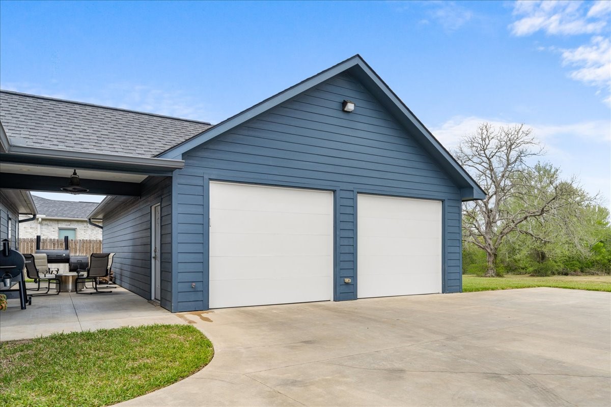 1207 Pecan Street Brenham, TX 77833 - Photo 3 of 29 a house view with a backyard space