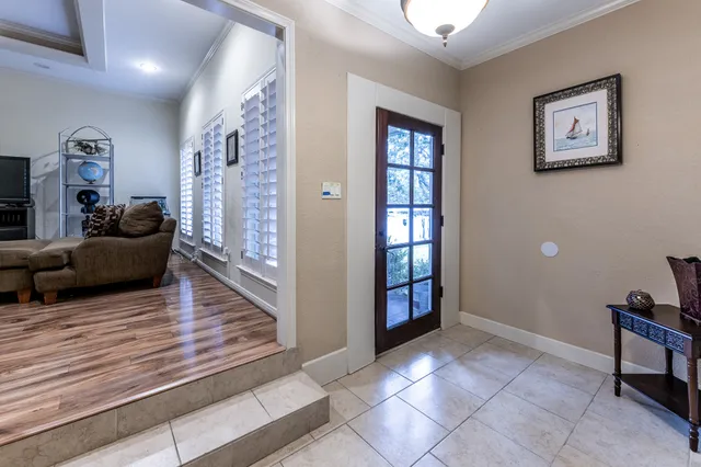a spacious bathroom with a granite countertop sink a mirror and a