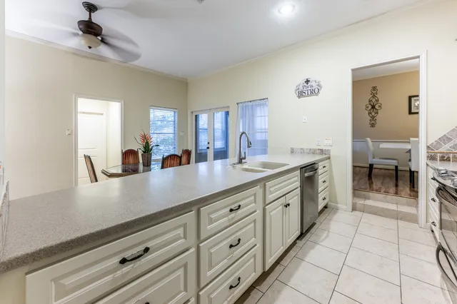 a bathroom with a toilet a sink and a mirror