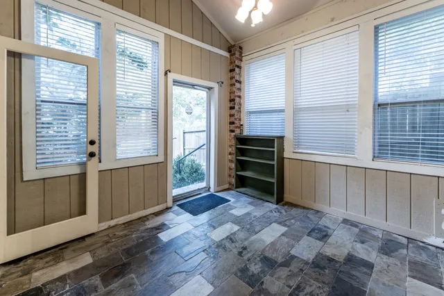 a utility room with sink dryer and washer