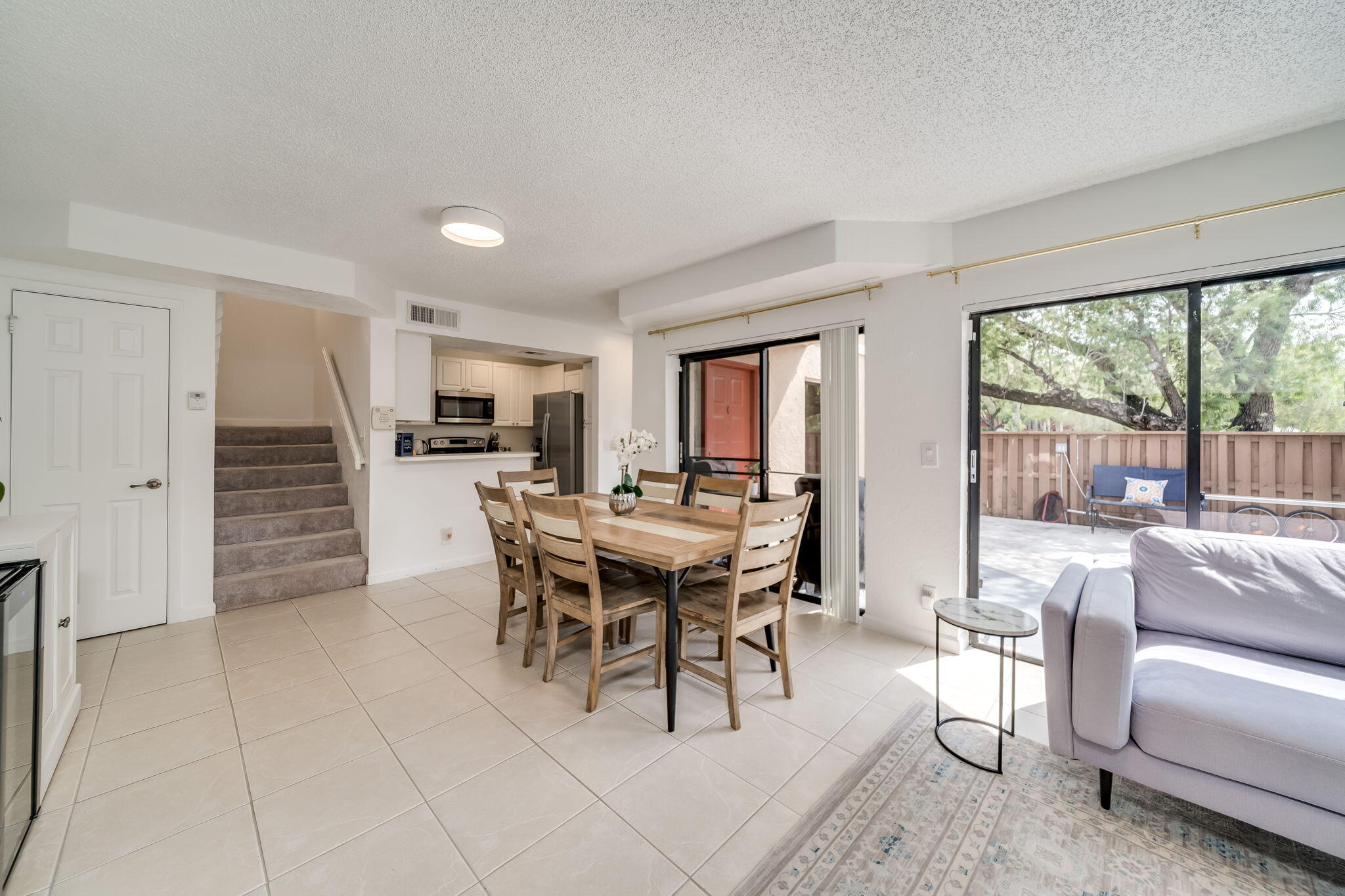8116 Severn Drive, Unit C Boca Raton, FL 33433 - Photo 13 of 52 a view of a dining room with furniture window and outside view