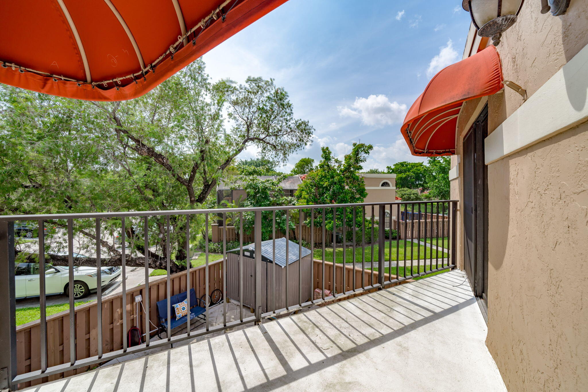 8116 Severn Drive, Unit C Boca Raton, FL 33433 - Photo 30 of 52 a view of a balcony with a floor to ceiling window