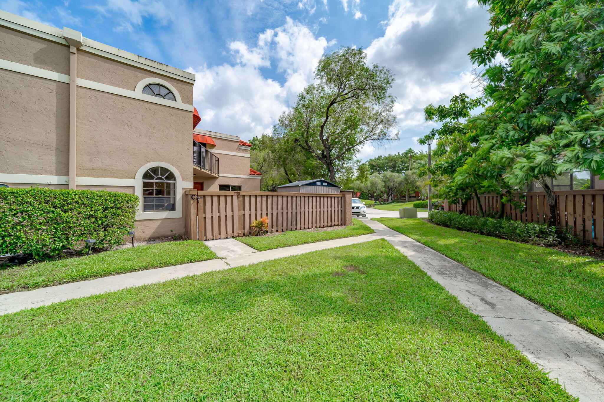 8116 Severn Drive, Unit C Boca Raton, FL 33433 - Photo 3 of 52 a view of a back yard of the house