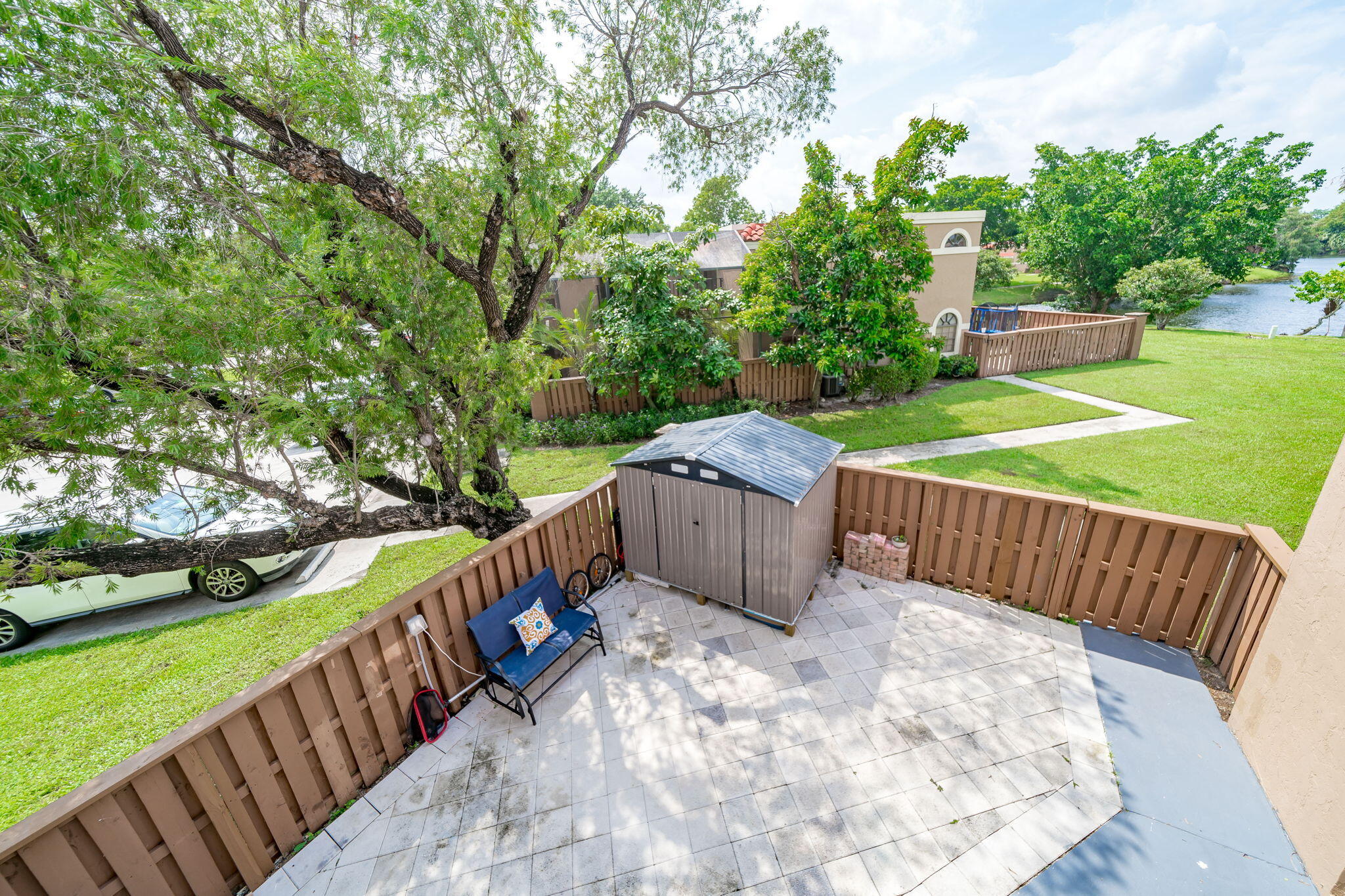 8116 Severn Drive, Unit C Boca Raton, FL 33433 - Photo 34 of 52 a view of a deck with a yard