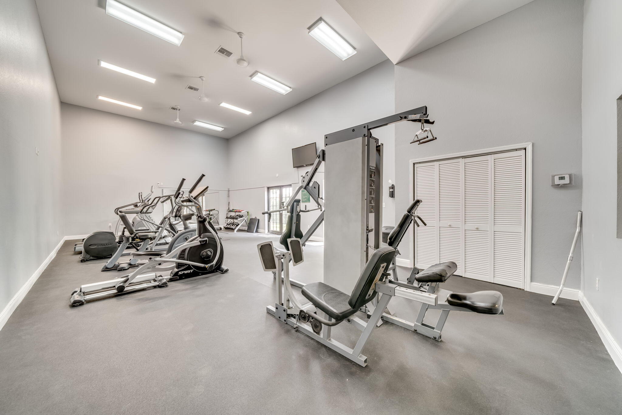 8116 Severn Drive, Unit C Boca Raton, FL 33433 - Photo 39 of 52 a view of a room with gym equipment