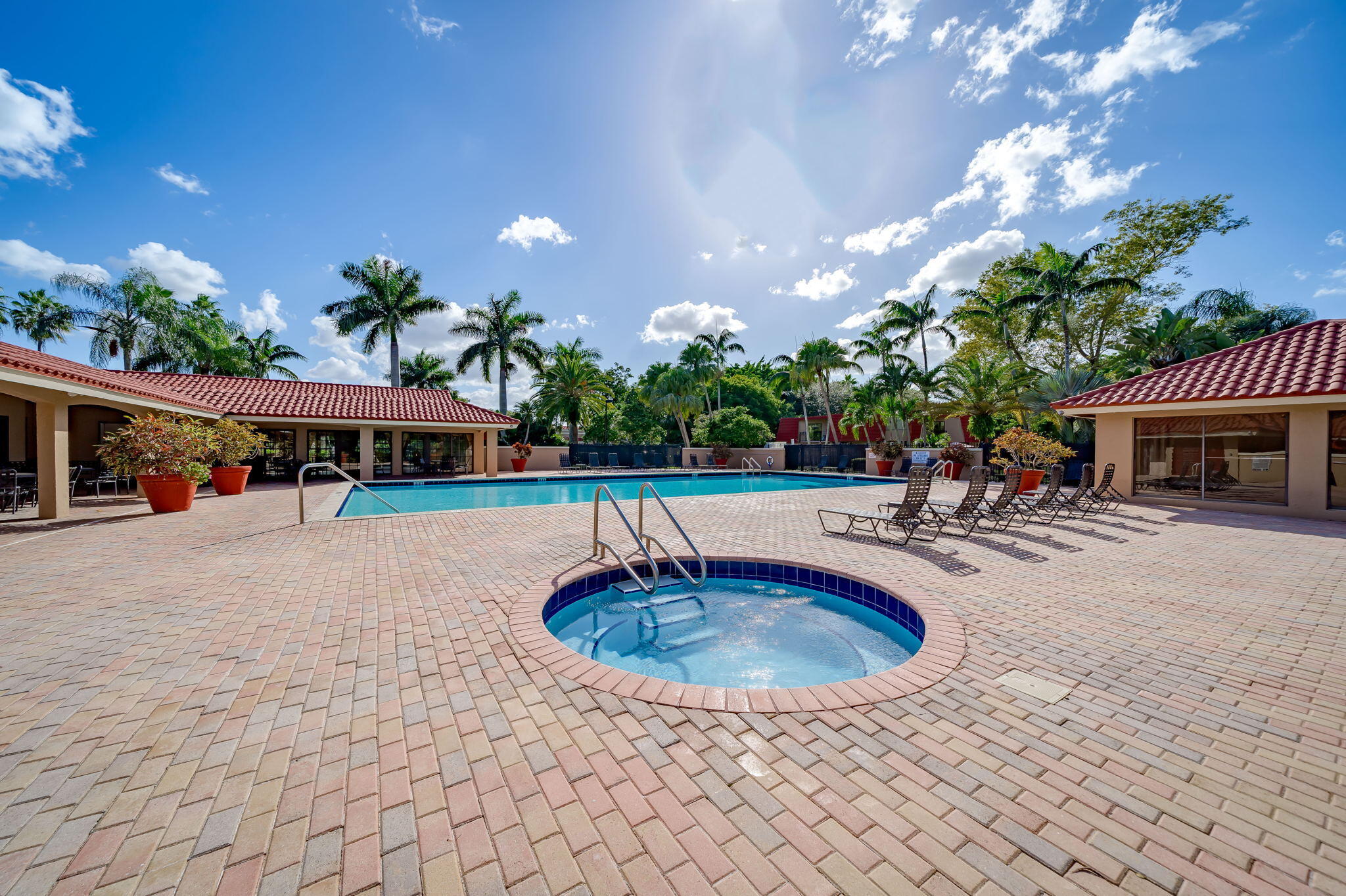 8116 Severn Drive, Unit C Boca Raton, FL 33433 - Photo 48 of 52 a swimming pool with outdoor seating yard and entertaining space