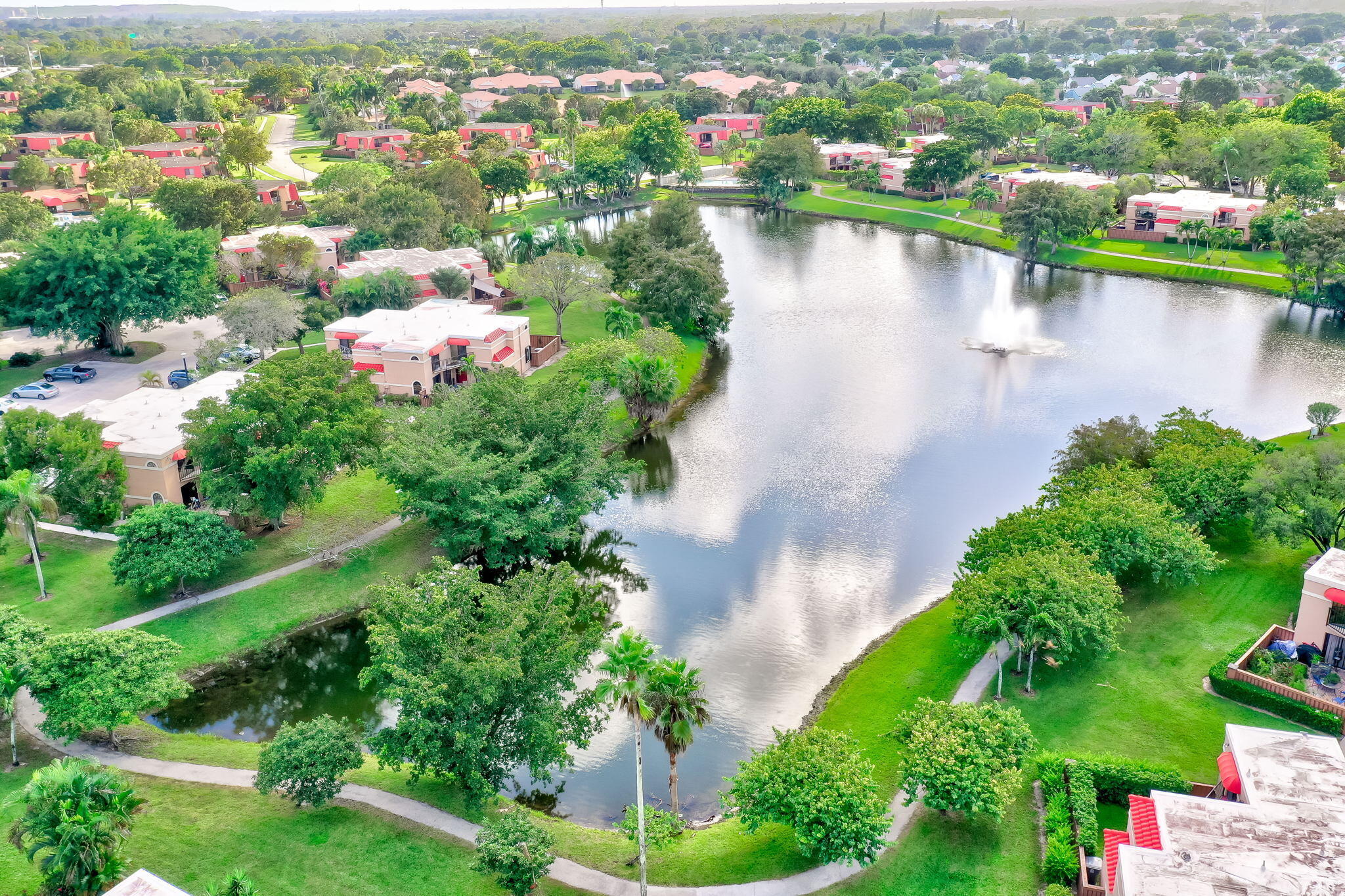 8116 Severn Drive, Unit C Boca Raton, FL 33433 - Photo 52 of 52 a view of a lake with a city