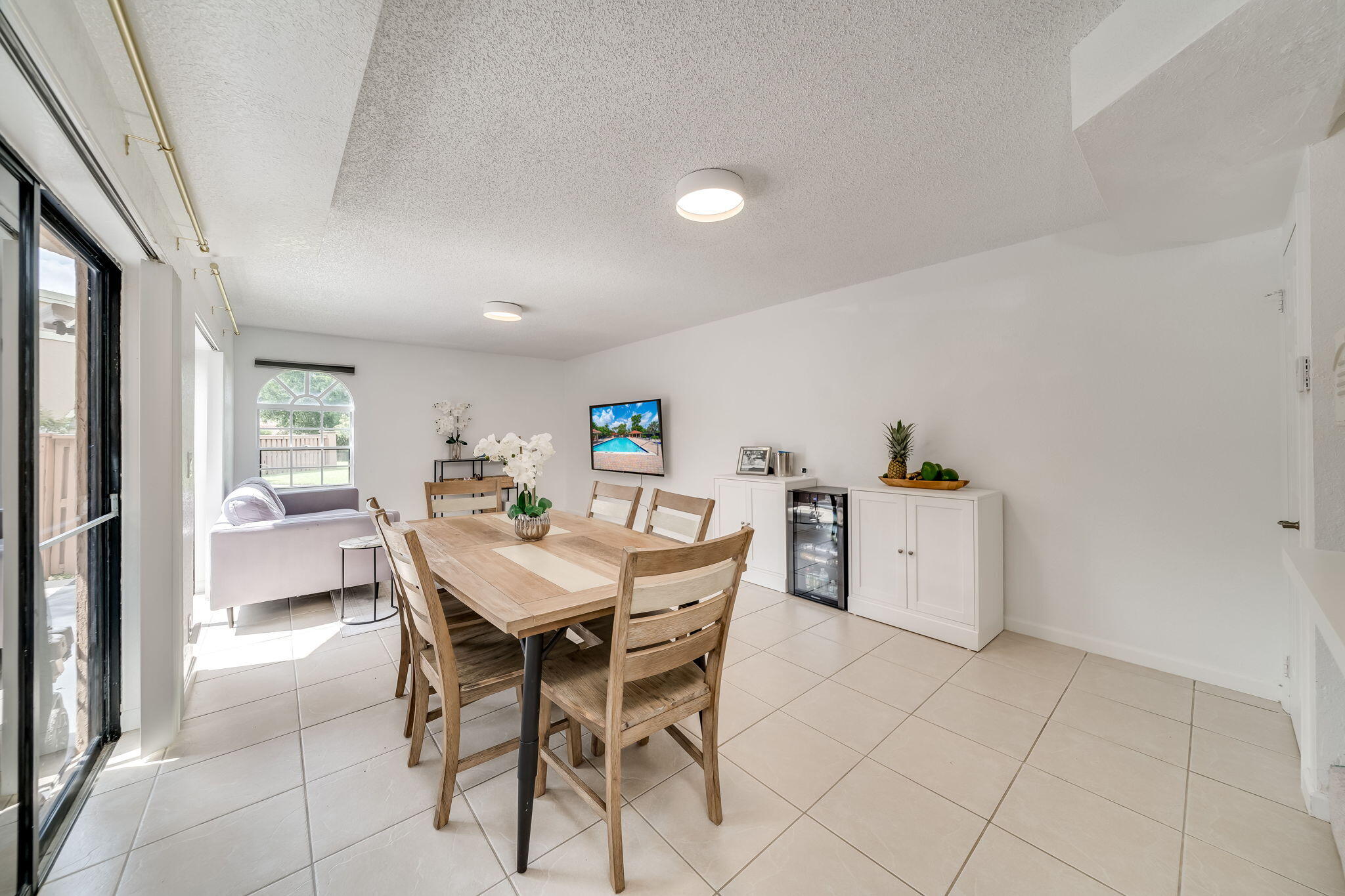 8116 Severn Drive, Unit C Boca Raton, FL 33433 - Photo 8 of 52 a view of a dining room with furniture