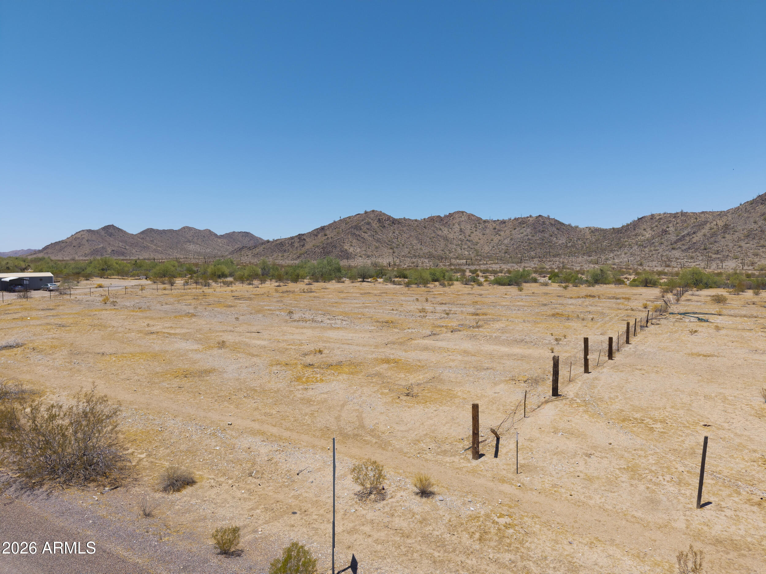 54650 West Ivory Road, Unit 57 Maricopa, AZ 85139 - Photo 2 of 17 a view of lake and mountain