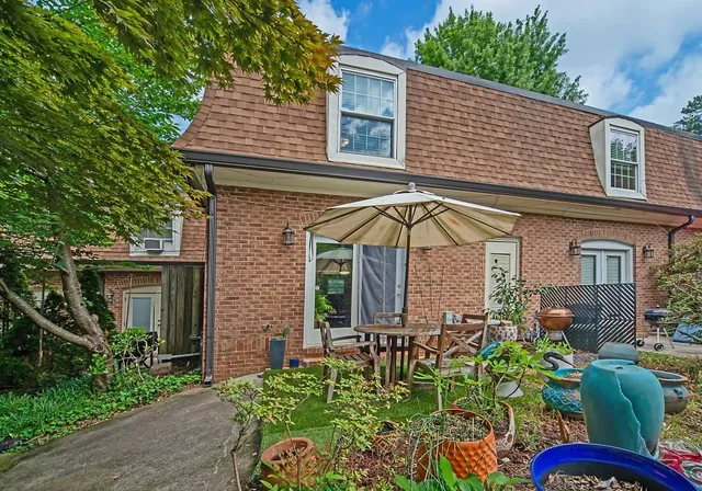 a view of a house with chairs