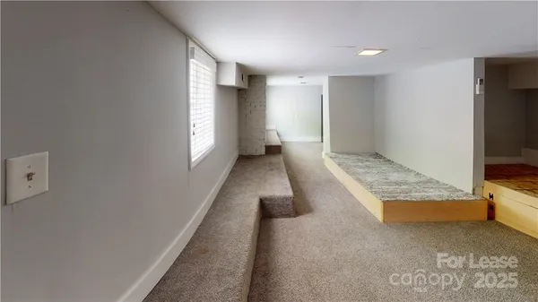 a view of livingroom with hardwood floor and window