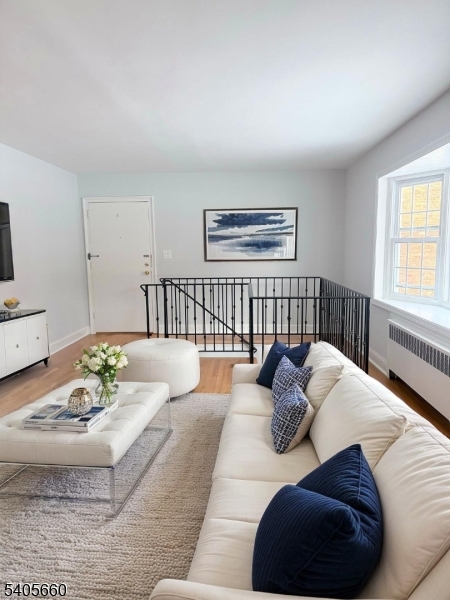 26 Locust Drive, Unit 47 Summit, NJ 07901 - Photo 2 of 12 a living room with furniture flowerpot and a window