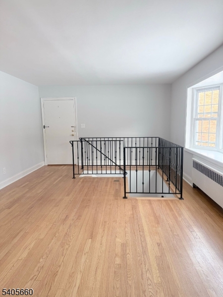 26 Locust Drive, Unit 47 Summit, NJ 07901 - Photo 3 of 12 a view of a balcony with wooden floor