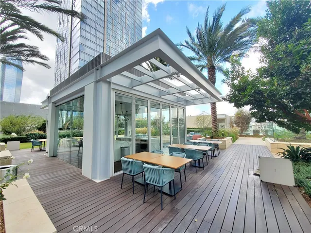 a building outdoor space with furniture and wooden floor
