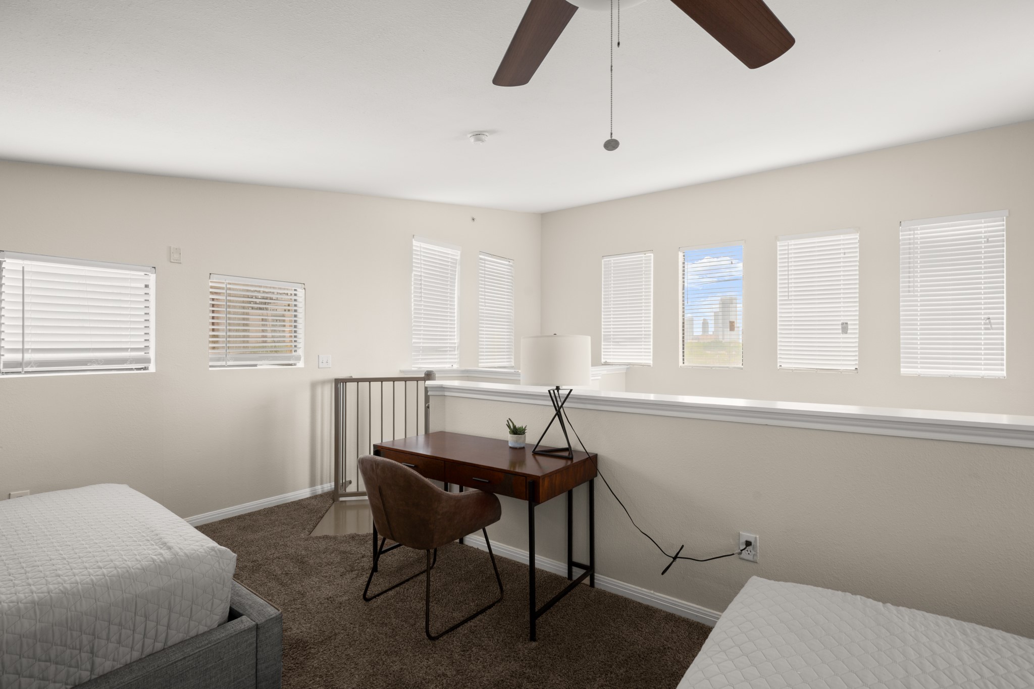 2502 Leon Street, Unit 512 Austin, TX 78705 - Photo 21 of 27 This upper-level space works well as a bedroom, study area, or additional living space.