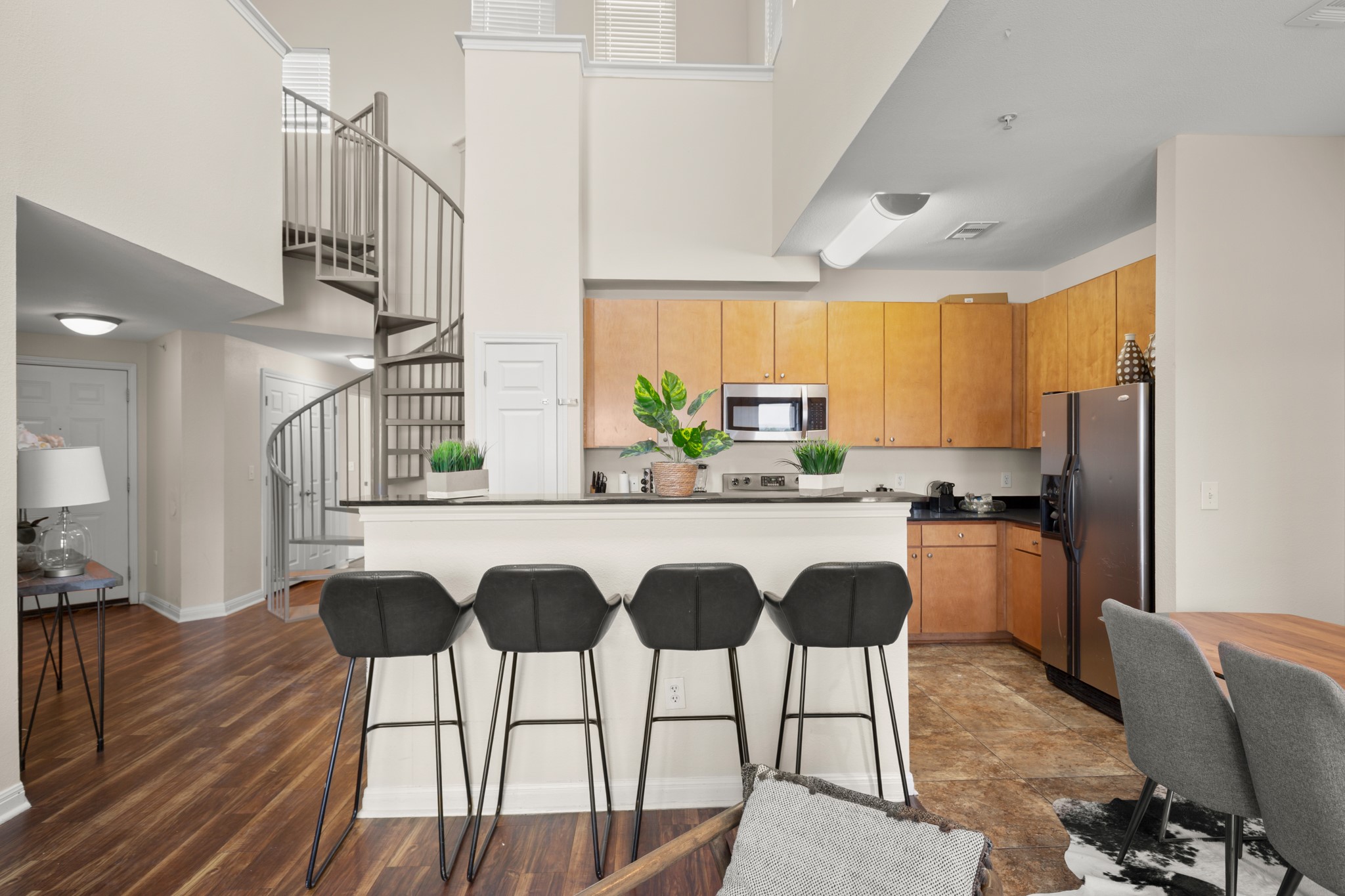 2502 Leon Street, Unit 512 Austin, TX 78705 - Photo 4 of 27 The kitchen features stainless steel appliances and ample cabinetry for everyday convenience.