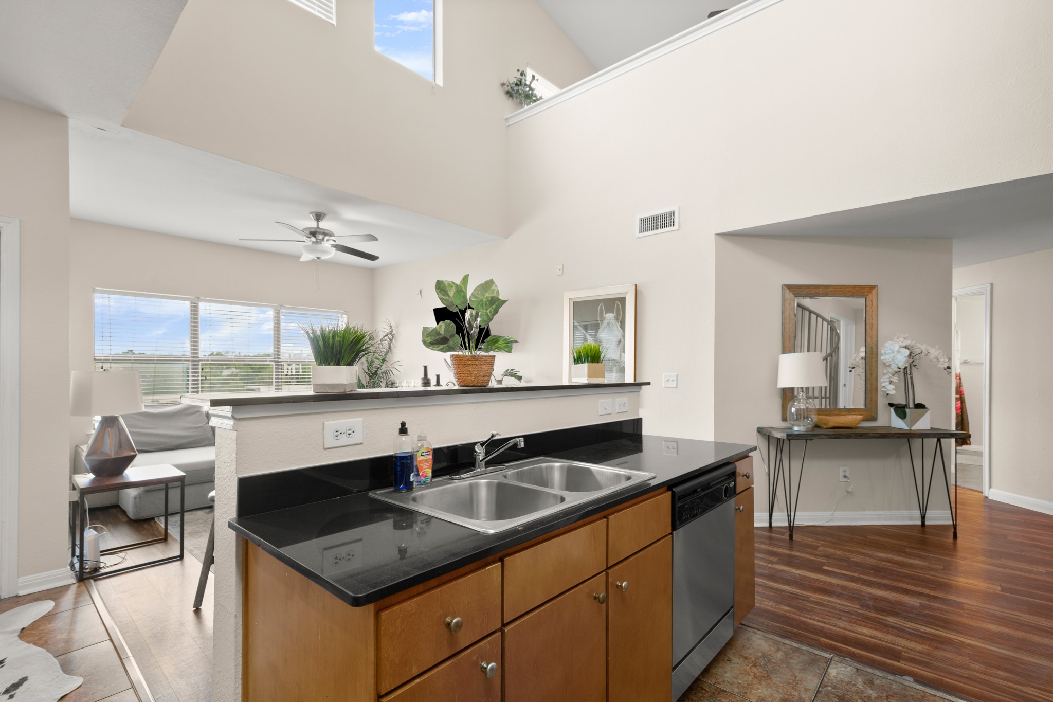 2502 Leon Street, Unit 512 Austin, TX 78705 - Photo 5 of 27 The kitchen overlooks the main living area, creating a connected and social layout.